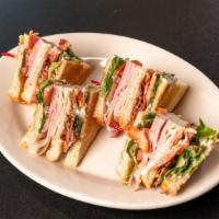 The Caboose Club Sandwich · Turkey, bacon, ham, lettuce, tomato, and mayonnaise on your choice of bread.