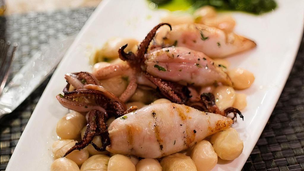 Calamari e Fagioli · Grilled Monterey Bay calamari with ‘Bianchi di Spagna’ beans. Arugula salad, olive crumbs, citrus dressing