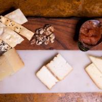 Formaggi · Assorted artisan cheeses , home made jam & almonds