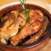 Pollo Arrosto in Tecia · Terra cotta roasted natural free-range mary's chicken, Yukon potatoes, bosane olives, and or...