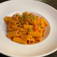 Rigatoni Alla Carcerata · Tube shape pasta with ground mild Italian sausage, red bell peppers, peas in tomato cream sa...