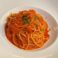 Capellini al pomodoro · Angel hair pasta with homemade tomato sauce and fresh basil