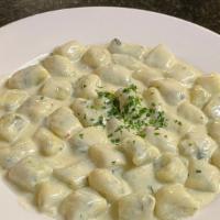 Gnocchi Di Patate Espinaci · Homemade potato and spinach dumplings in gorgonzola cheese cream sauce.