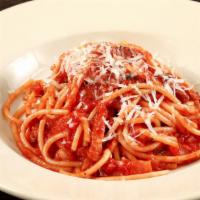 Bucatini All'amatriciana · Long hollow pasta, tomato, pancetta, onion, chili pepper, pecorino.
