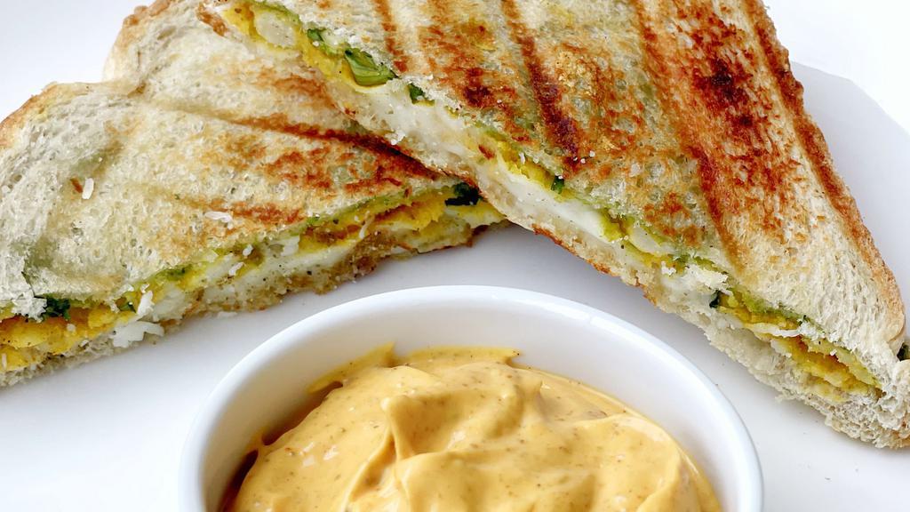 Aloo Chutney · Sandwich layered with potato masala and cheese and mint chutney.
