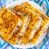Quesadilla · Flour tortilla, cheese, beef Birria, cilantro, red onion.


*our birria is made with beef, i...