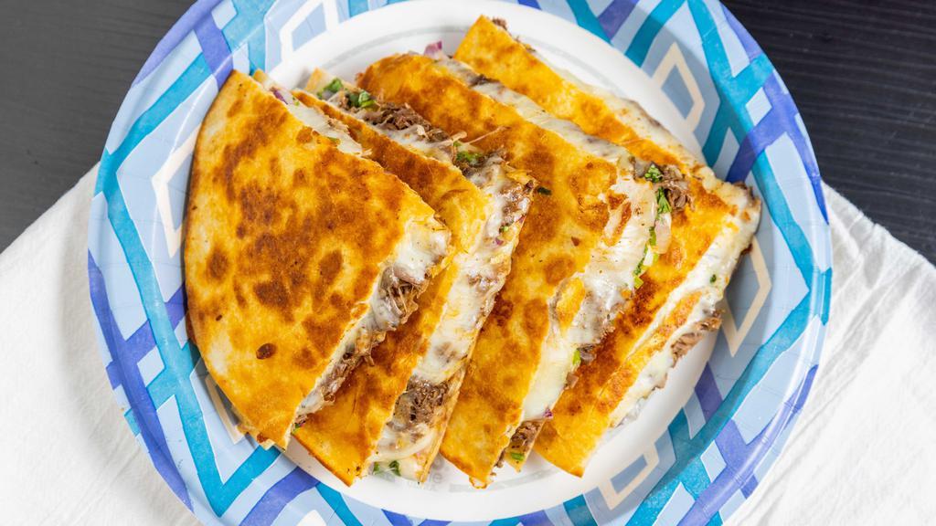 Quesadilla · Flour tortilla, cheese, beef Birria, cilantro, red onion.


*our birria is made with beef, if you prefer chicken please write on the comments 
