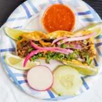 Tacos · Corn tortilla, beef Birria, cilantro, red onion.


*our birria is made with beef, if you pre...