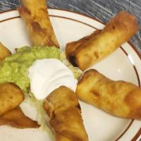 Chimichangitas · Chicken Picadillo or Mix Vegetables Wrapped in Flour Tortilla, Served with Guacamole, and So...