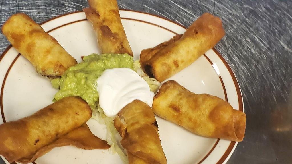 Chimichangitas · Chicken Picadillo or Mix Vegetables Wrapped in Flour Tortilla, Served with Guacamole, and Sour Cream.