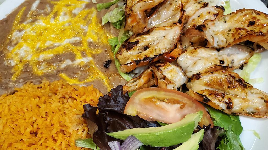 Camarones Ala Plancha · Butterfly Cut Shrimp, Served with Rice, Beans and Salads