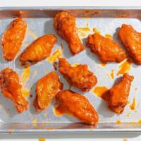 10 Sweet and Spicy Wings · Chicken wings tossed in a sweet and spicy sauce.