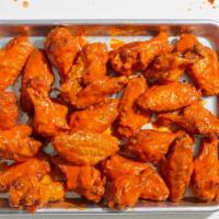 20 Sweet and Spicy Wings · Chicken wings tossed in a sweet and spicy sauce.