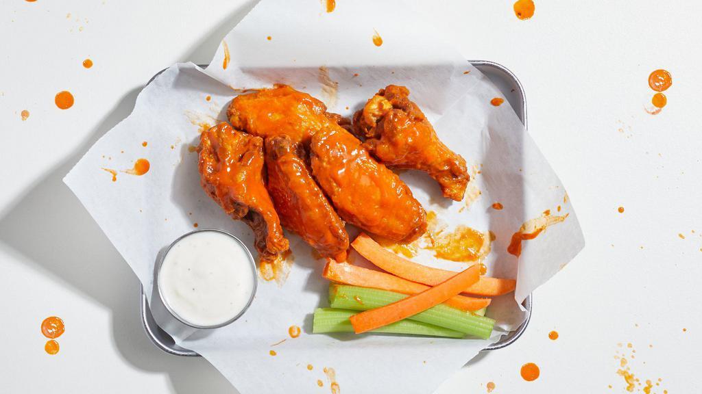 5 Sweet and Spicy Wings · Chicken wings tossed in a sweet and spicy sauce.