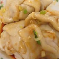 Pork Dumplings · Crescent dumplings filled with pork and vegetables.  Please specify if you would like hot sa...