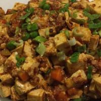 Kung Pao Tofu · Lightly fried bean curd with vegetables in kung pao style sauce.