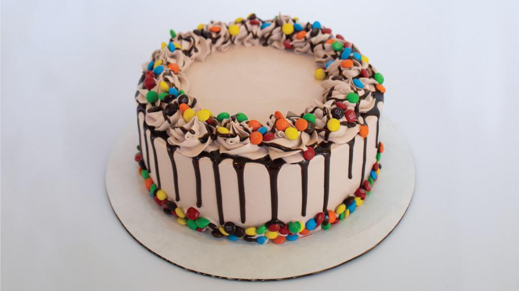Dandy Candy Froyo Cake · Calling all M&M's lovers! This froyo cake has Chocolate Cake, Chocolate and Vanilla Froyo, Oreos, and Chocolate Fudge. This cake comes as a 7” round cake and serves 10-12 people.