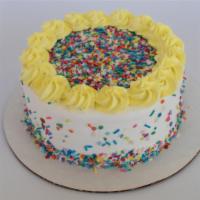 Confetti Froyo Cake · Cue the Confetti! Not only is this cake covered in delicious sprinkles, but the inside is a ...