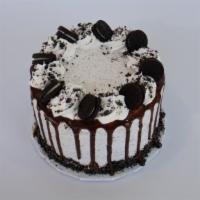 Chocolate Cookie Crumble Froyo Mini Cake · Oreo explosion! This cake is covered in Oreos and includes White Cake, Cookies & Cream and V...