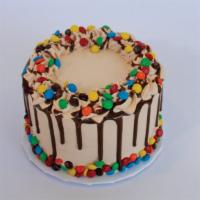 Dandy Candy Froyo Mini Cake · Calling all M&M's lovers! This froyo cake has Chocolate and Vanilla Froyo, Oreos, and Chocol...