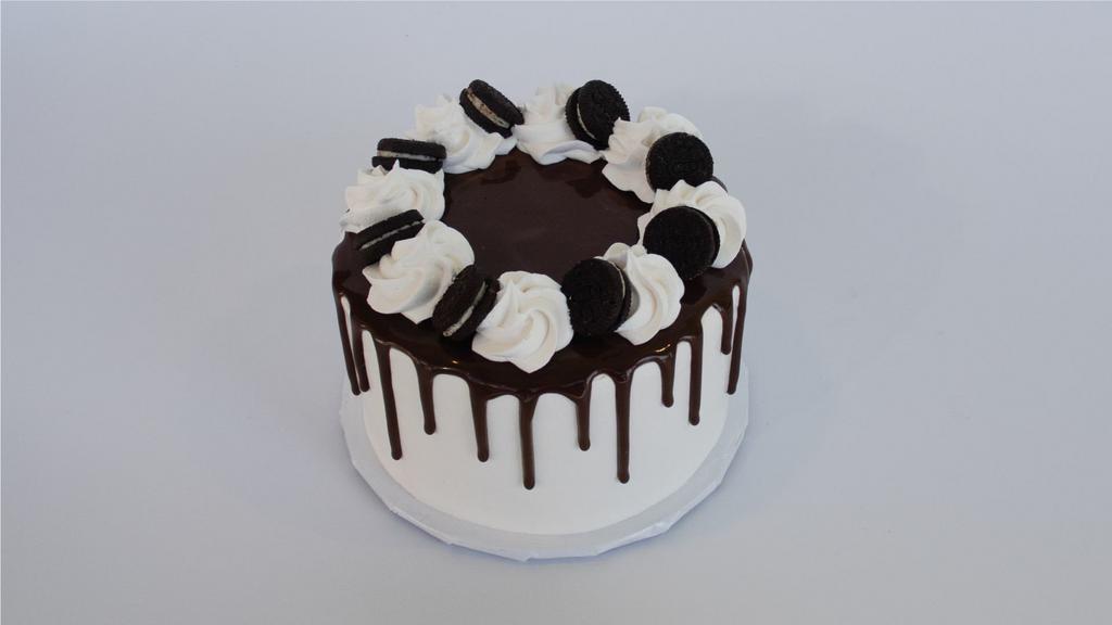 Cookies N'Cream FroYo Mini Cake · Our most popular cake features your favorite cookie – Oreos! Inside you’ll find White Cake, Cookies & Cream, and Vanilla Froyo, Oreos, and Chocolate Fudge. Your choice of 7” Round Cake (serves 10-12 people) or Quarter Sheet (serves 24-30 people).