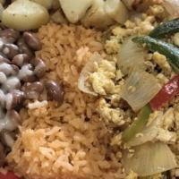 Huevos A La Mexicana (Veggie) · Scrambled eggs mix with tomatoes, onions, jalapeños and bell pepper. Served with rice, beans...