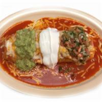 Wet Burrito · Choice of meat rice, beans. Topped with choice of red or green enchilada sauce. Melted chees...