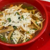 Chicken Tortilla Soup · Chicken, mixed vegetables, tortilla strips, onions and fresh mexican cheese