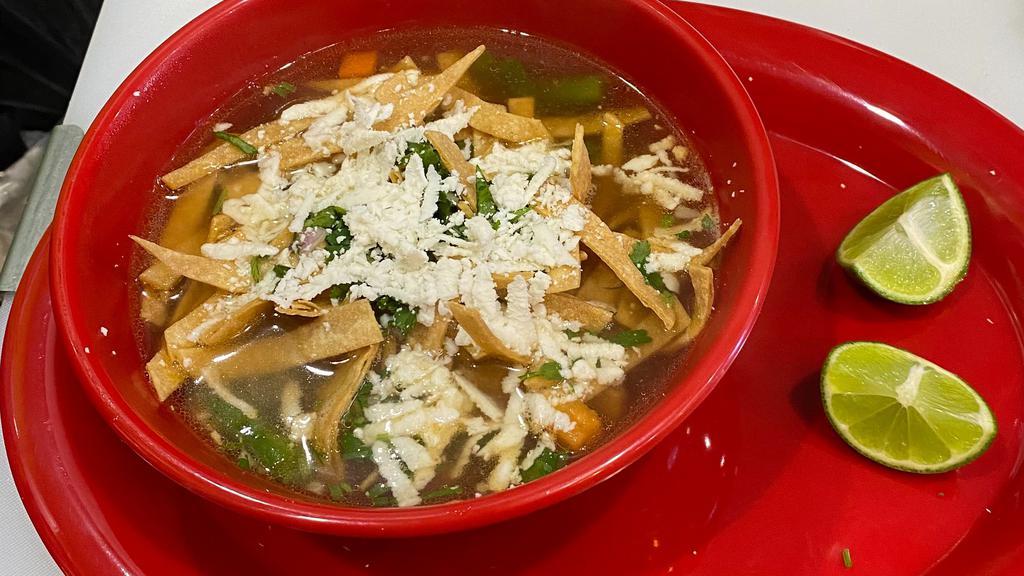 Chicken Tortilla Soup · Includeschicken breast, vegetables, rice, avocado, fresh cheese and tortilla strips