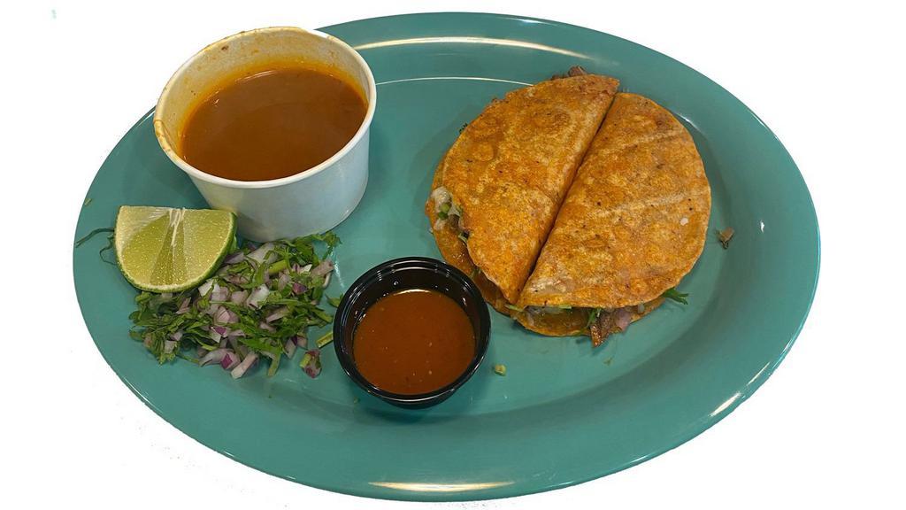 2 Quesabirrias and Consome (Broth) · Two quesabirrias with cheese, birria, ocions and cilantro. Served with a 6oz Broth