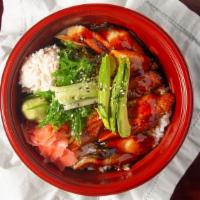 Unagi Bowl · Broiled fresh water eel with avocado slices over bed of rice with unagi sauce.