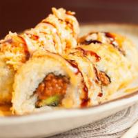 Fire in the Hall Roll · In: spicy tuna, avocado roll deep fried; out: spicy crab/spicy sesame sauce.