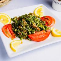 Tabouleh · Vegetarian salad made out of parsley, tomatoes, mint, onions, and olive oil, and lemon juice.