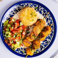 Chivalrous Chicken Bowl · Skewered pieces of chicken breast marinated in a Mediterranean blend of herbs and spices ser...