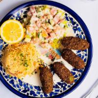 Egyptian Falafel Bowl · Falafel balls topped with house sauce, white sauce, parsley and onions served with yellow ri...