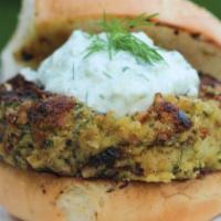 Falafel Burger · Our house-made falafel burger topped with cheese, lettuce, tomatoes in a bun. Add-on fries a...