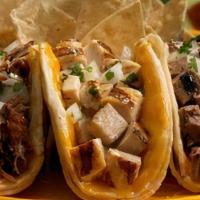 Mexico City Tacos · Three tacos, chicken, carne asada or carnitas in any combination, with rice, onions, cilantr...