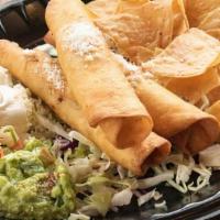 Chicken Taquitos · Three jumbo taquitos stuffed with chicken and black beans. Served with guacamole and sour cr...