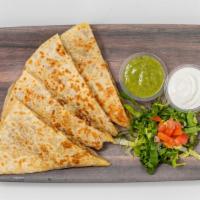 Quesadilla · Flour tortilla, filled with cheese. Served with lettuce, tomato, guacamole, and sour cream.