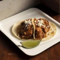 Tinga de Pollo Tacos · Two Braised Chicken Tacos with Chipotle and Onions, Topped with Pequin Salsa and Queso Fresc...