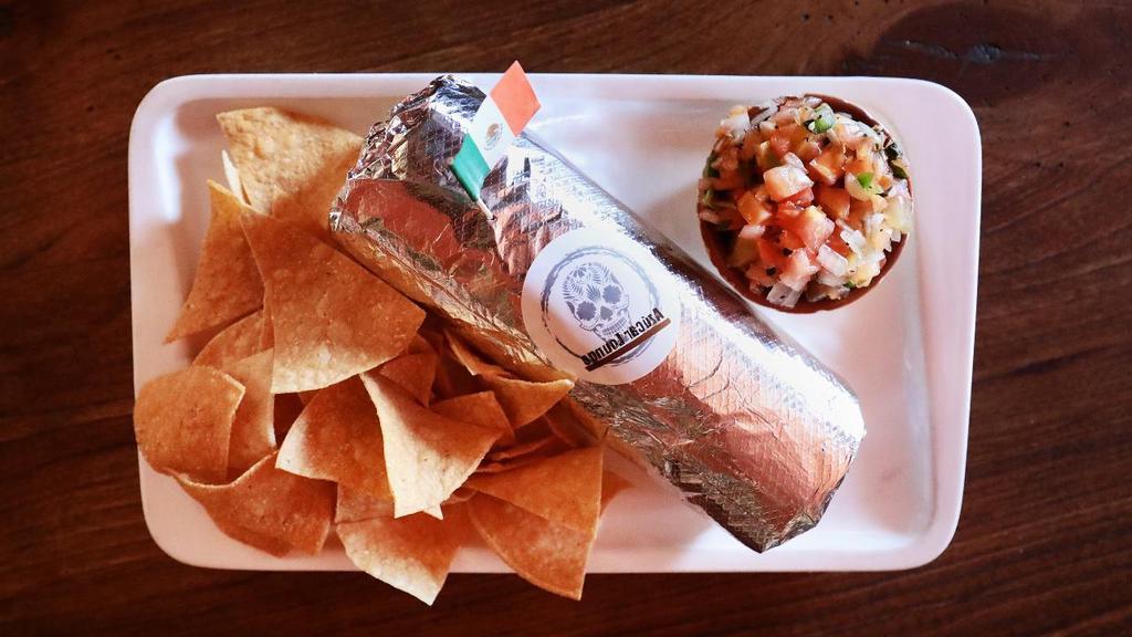 Regular Burrito · Flour Tortilla with vegetarian Mexican Rice, salsa fresca and your choice of vegetarian beans and burrito filling.  Our burritos come with a complimentary side of chips and salsa fresca.