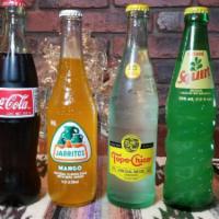 Mexican Squirt 12oz · Mexican Squirt made with real cane sugar.  Comes in a 12oz glass bottle