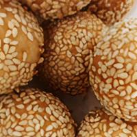 #258. Fried Sesame Ball · Rice pastry balls with sweet Red Bean paste filling coated with Sesame Seeds with a crispy o...