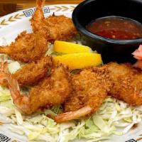 Appetizer Coconut Shrimp · (6)pcs coconut fried shrimp served golden and crispy with a side of sweet Thai chili sauce a...