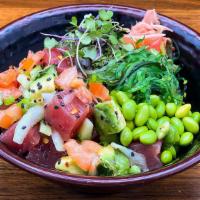Avocado-Tomato-Ahi Poke Bowl · Cubed avocado, cubed tomato, sweet onion, green onion, shoyu marinated ahi tuna, white sesam...