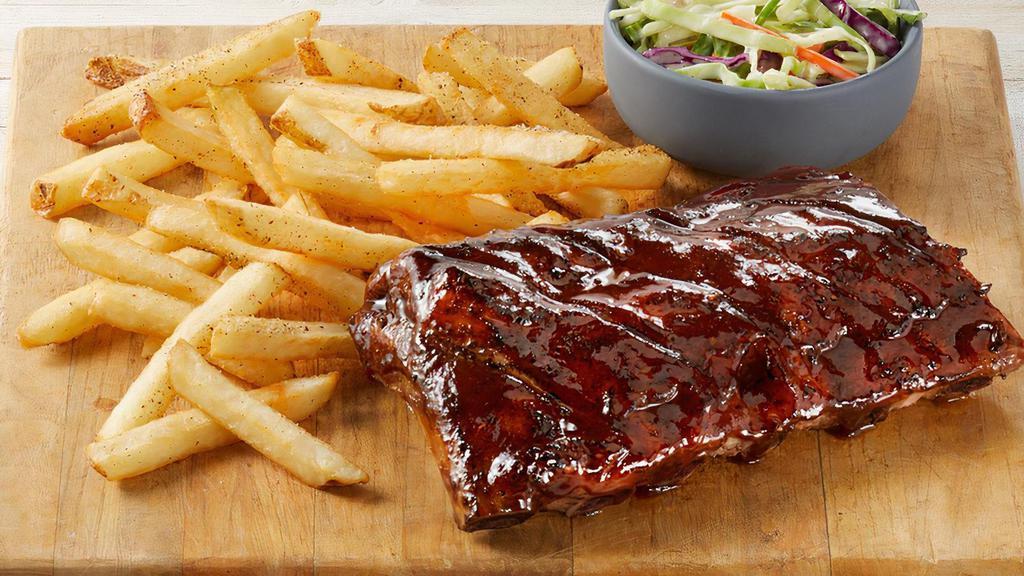 Half Rack Of Fridays Big Ribs Apple Butter Bbq · Half-Rack of double-basted pork ribs basted in Apple Butter BBQ served with seasoned fries & coleslaw.