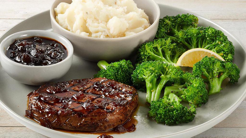 Center-Cut Sirloin Topped With Whiskey Glaze · 6 ounces of flavorful center-cut sirloin topped with Signature Whiskey-Glaze.  Served with mashed potatoes and lemon-butter broccoli.