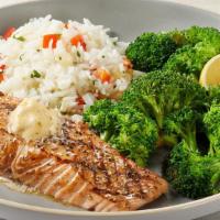 Simply Grilled Salmon · Seasoned with hickory-smoked sea salt and topped with Parmesan Butter. Served with lemon-but...