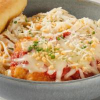 Chicken Parmesan Pasta · Crispy chicken breast with marinara and cheese on fettuccine Alfredo. Topped with Parmesan c...