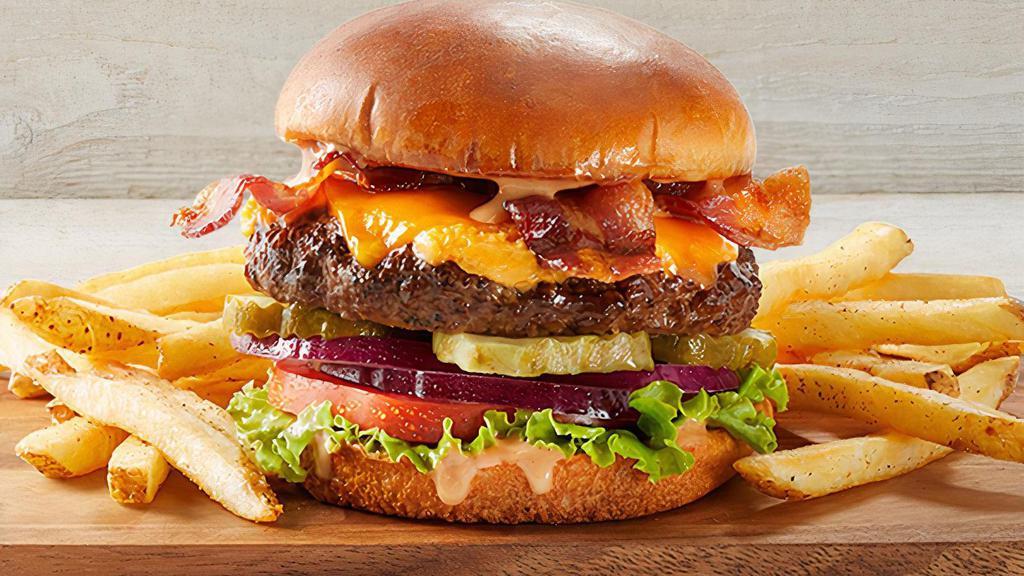 Bacon Cheeseburger · Cheddar, all-natural cheddar spread, lettuce, tomato, red onions, pickles, bacon & Fridays™ sauce.